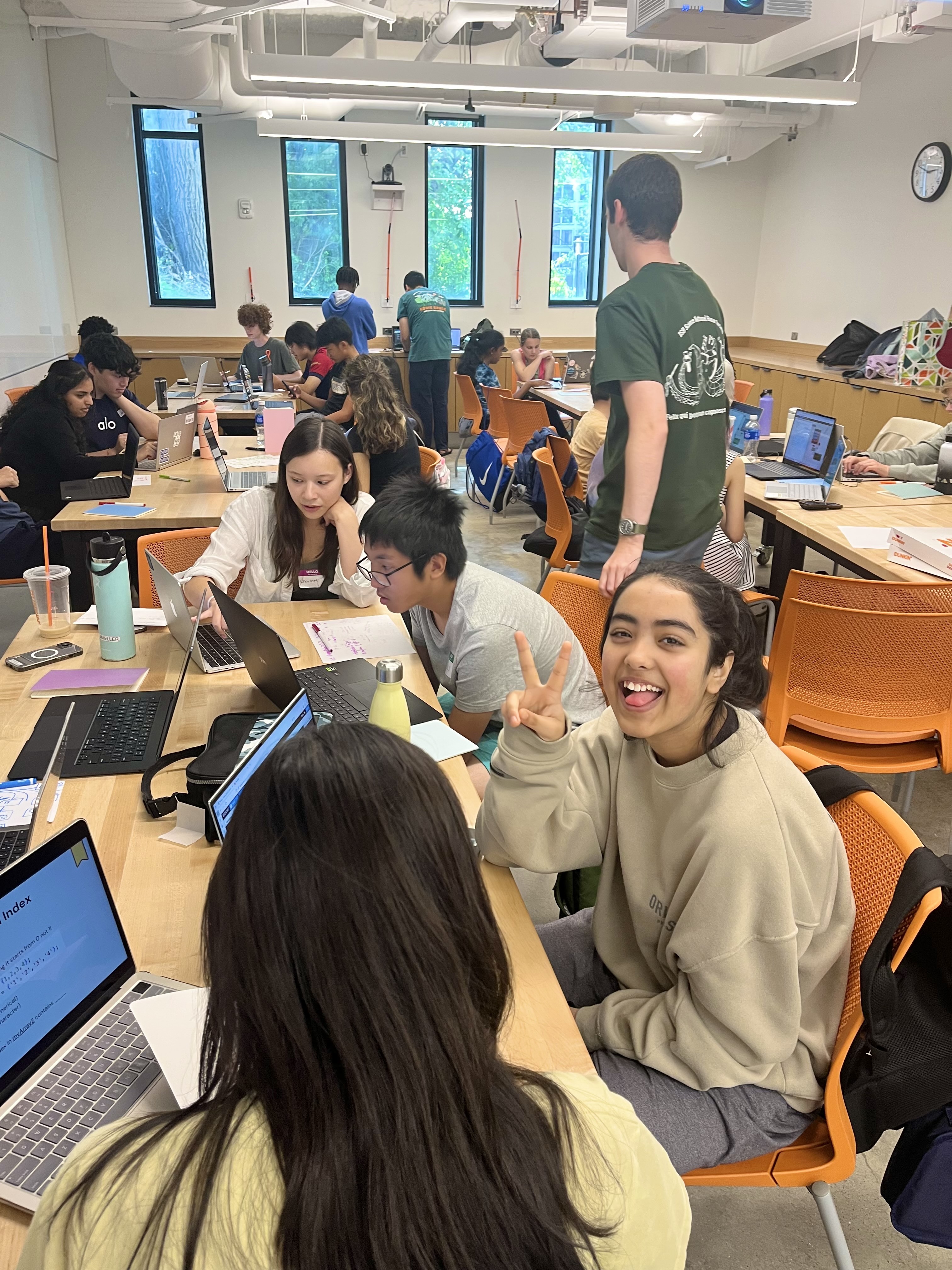 Students learning to code during a CurioLab session
