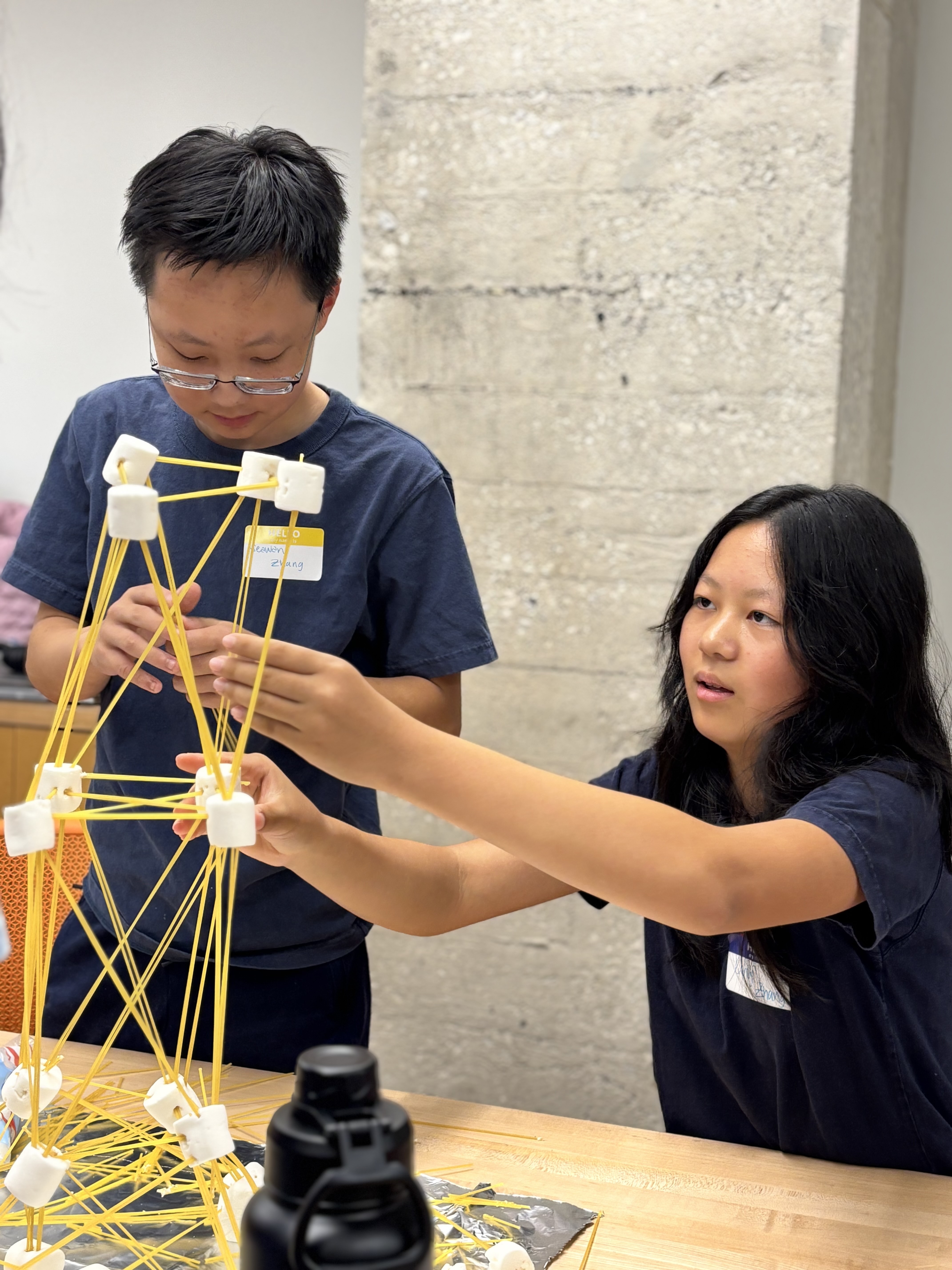 Students learning to code during a CurioLab session